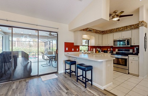 Gulf Cove House | Cozy home with private pool, lanai, central AC & washer/dryer