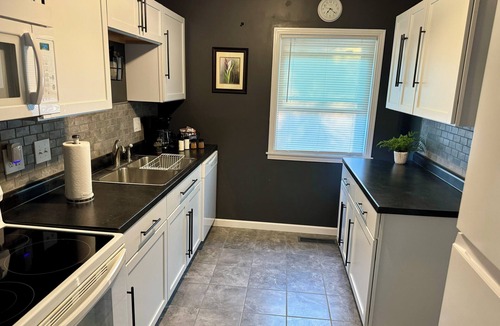 Salina House | Cozy home with privacy fence, fire pit & garage!