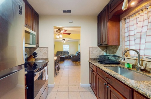 Tampa House | Cozy home with screened lanai foosball and fenced yard