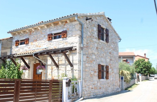 Rakalj House | Cozy istrich stone house with fireplace and garden