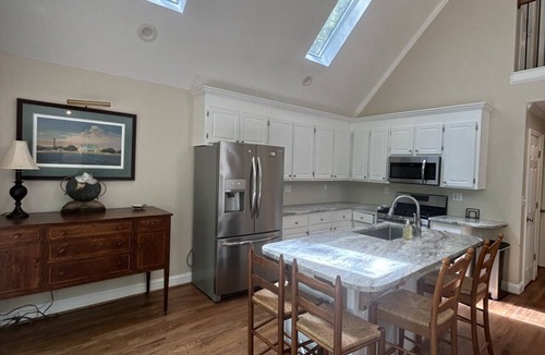 Henderson House | Cozy Kerr Lake waterfront home with private boat dock.