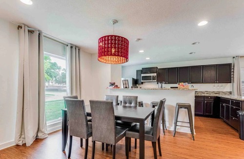 Plano House | Cozy, KING BED, Outdoor Movie Theater, Fire Pit