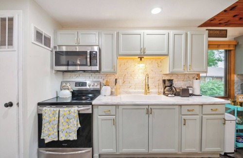 Baldwin Cottage | Cozy lake front cottage in Baldwin, MI with hot tub!