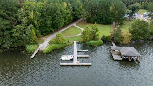 Wise House | Cozy Lake Getaway with Firepit, Lake Access, Theatre