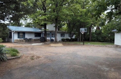 Mead House | Cozy lake retreat in Sand Point! Game room with deck and views of Lake Texoma.
