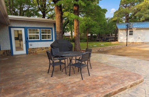 Mead House | Cozy lake retreat in Sand Point! Game room with deck and views of Lake Texoma.