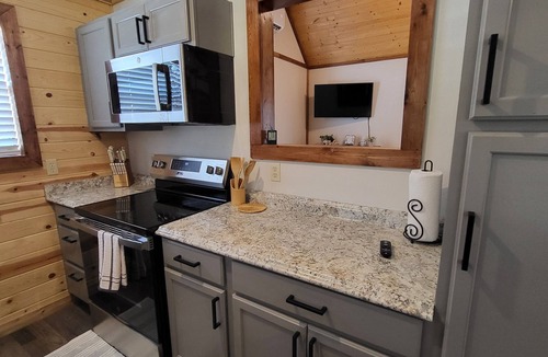 Gilmer Cabin | Cozy Lakefront 2-bedroom cabin in tranquil Big Sandy, TX.