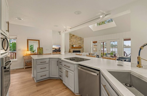 Lakewood Cottage | Cozy Lakefront Cottage Fireplace, Views + Spa Bath