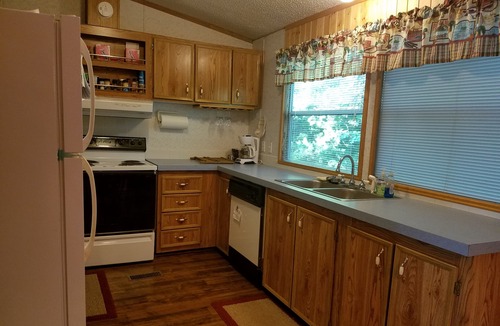 Hawkins House | Cozy Lakefront Family Friendly Home With Large Covered Porch And Private Dock.