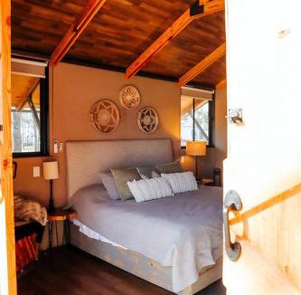 Bastrop House | Cozy Lakefront Glamping Cabin with Private Patio near Austin, Texas