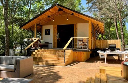 Bastrop House | Cozy Lakefront Glamping Cabin with Private Patio near Austin, Texas