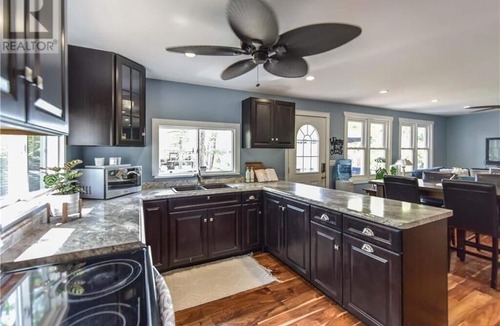 Big Chute Cottage | Cozy Lakeside Cottage Retreat with Kayaks, Paddle Boat & Sunset Waterfront Views