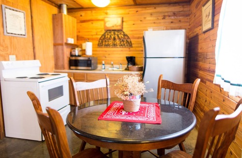 Sand Springs Cabin | Cozy Lakeside Log Cabin on a Private Lake. Once stayed by Sir Paul McCartney!