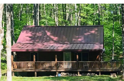 Bellaire Cabin | Cozy Log Cabin in a Quiet Beautiful Wooded Setting
