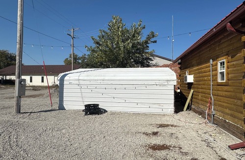 Moravia Cabin | Cozy log cabin located in downtown Moravia, Iowa.