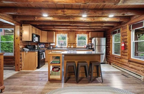 Fishers Hill Cabin | Cozy Log Cabin w Porch, Fire Pit, Games & River