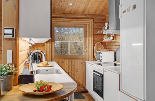 Bønnerup Strand House | Cozy log cabin with a panoramic view