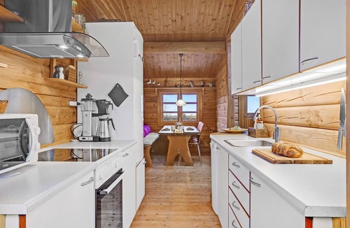 Bønnerup Strand House | Cozy log cabin with a panoramic view