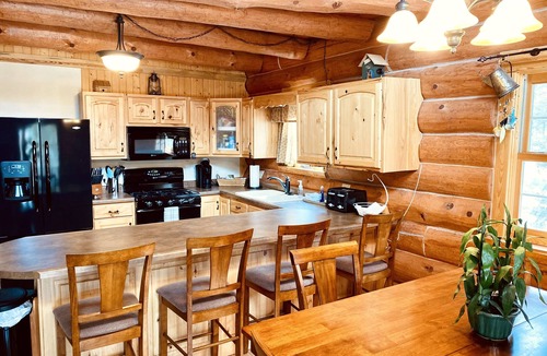 Rome Cabin | Cozy Log Cabin with fireplace, pool table, deck, and spacious kitchen!