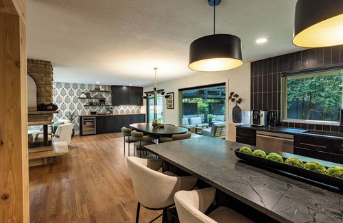 West Bloomington House | Cozy Luxe 4 Bedroom Home: Fireplace, Gym, Office, Fire Pit