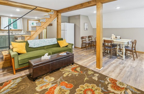 Ludington Cabin | Cozy Michigan Escape w/ Deck, Fire Pit & Grill!