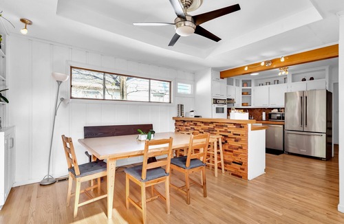 Loring Heights House | Cozy Midtown retreat with skyline views, private yard, deck, firepit, & W/D