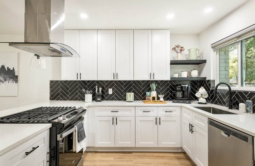 McNeil House | Cozy & Modern Home with King Beds, Fenced Yard, Fast Wi-Fi