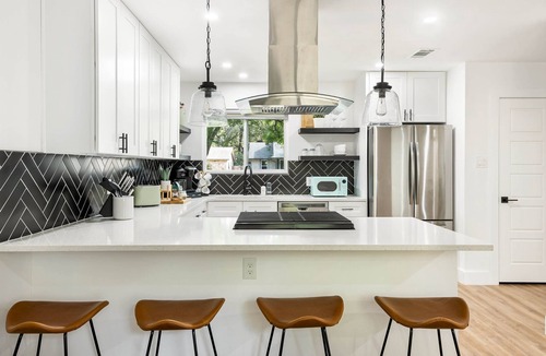 McNeil House | Cozy & Modern Home with King Beds, Fenced Yard, Fast Wi-Fi