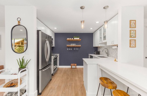 Riverbend House | Cozy North Bend Riverfront Cabin w/hot tub!