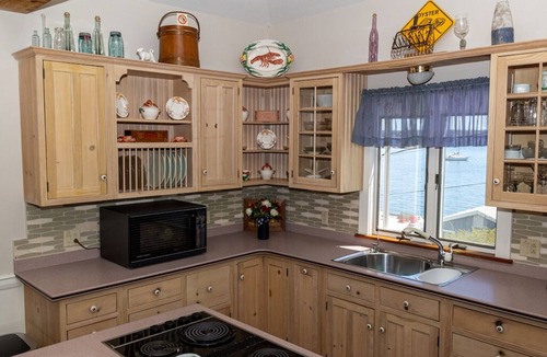 Five Islands Cottage | Cozy Ocean Side Cottage with screened in Sun room! 5 minutes from Private beach