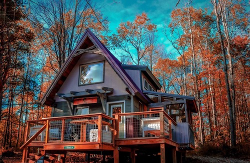 Corning Cabin | Cozy Off-grid Cabin within a private setting loaded with spa like amenities