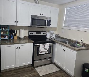 Regina Apartment | Cozy One Bedroom Basement Suite in Harbour Landing- MO's Place