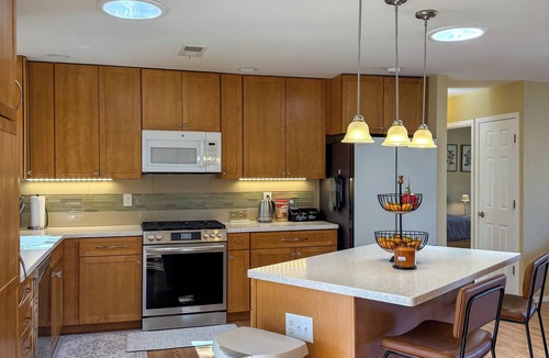 Northeast Heights House | Cozy open concept living with backyard.
