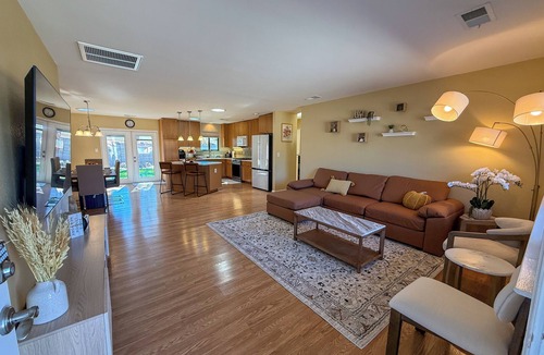 Northeast Heights House | Cozy open concept living with backyard.