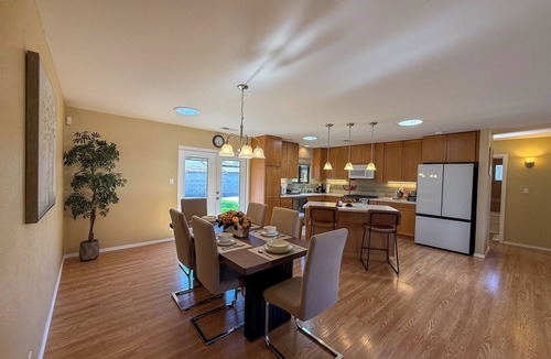 Northeast Heights House | Cozy open concept living with backyard.