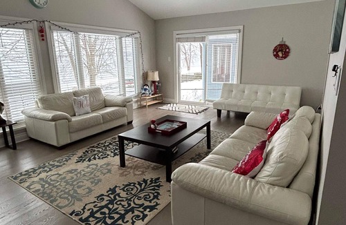 Laurentian Valley House | Cozy Ottawa River Retreat: Festive Decor, Fireplace, & Scenic Views Await