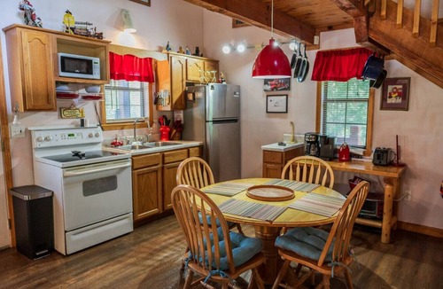 Sevierville Cabin | Cozy Pet Friendly Cabin! Pool Access, & Hot Tub!
