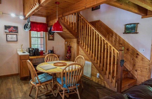 Sevierville Cabin | Cozy Pet Friendly Cabin! Pool Access, & Hot Tub!