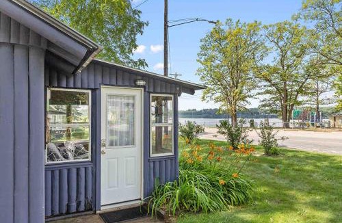 Newaygo House | Cozy pet-friendly cabin with dock, firepit, bikes, BBQ
