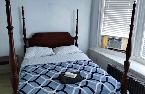 Park Hill Apartment | Cozy private bedroom with shared bathroom in charming Yonkers with AC