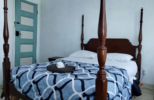 Park Hill Apartment | Cozy private bedroom with shared bathroom in charming Yonkers with AC
