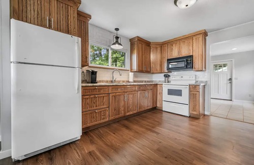 Kalkaska Cottage | Cozy Private Lakefront Cottage, Pet-Friendly with Private Dock