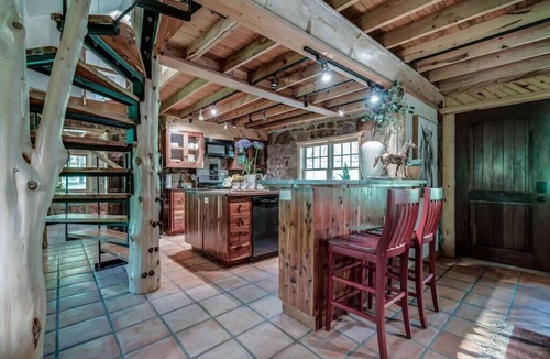 Edmond House | Cozy Route 66 Cabin with Hot Tub - The Gate House — a cozy, beautifully curated retreat in Edmond, OK.