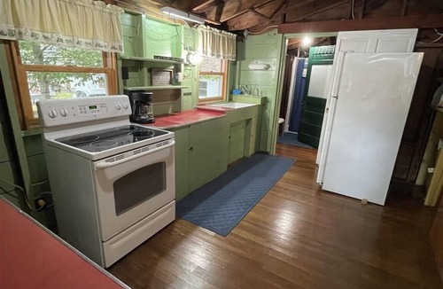 South Casco Cottage | Cozy rustic cottage with country charm