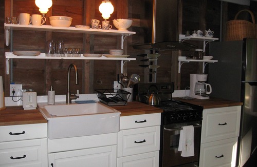 Suttons Bay Cottage | Cozy, Rustic Little Cottage In The Woods