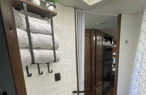 Aztec House | Cozy RV on working farm. 1 bedroom with queen size bed, 2 twin size beds.