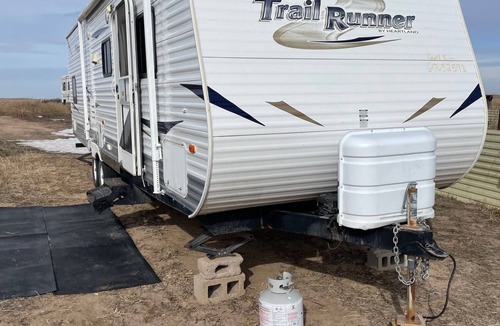 Cope House | Cozy RV on working ranch in Akron/Otis area with AC