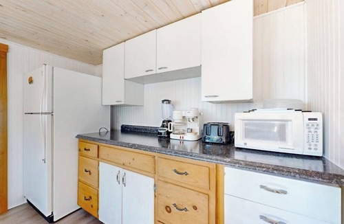 Trenton Cabin | Cozy seaside retreat w/waterfront deck, expansive lawn, & breathtaking sunsets