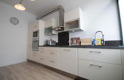 Quartier de la Maison-Blanche Apartment | Cozy Select