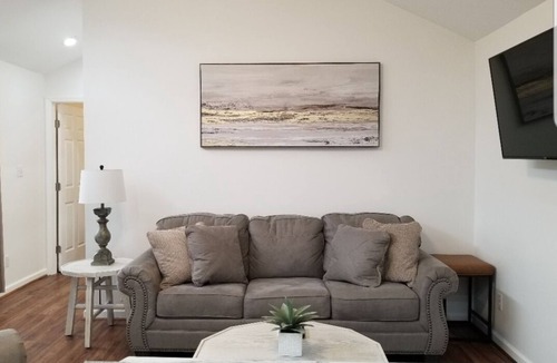 Phenix City Ski Chalet | Cozy, spacious tiny home with porch and BBQ